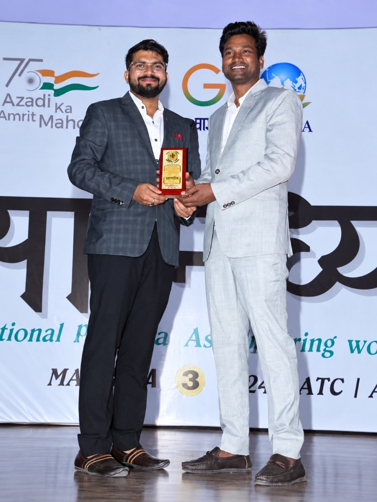 Receiving award from Dr. Ajit Singh